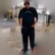 Timothy Pascal, a student: a man dressed in black standing on a paved square