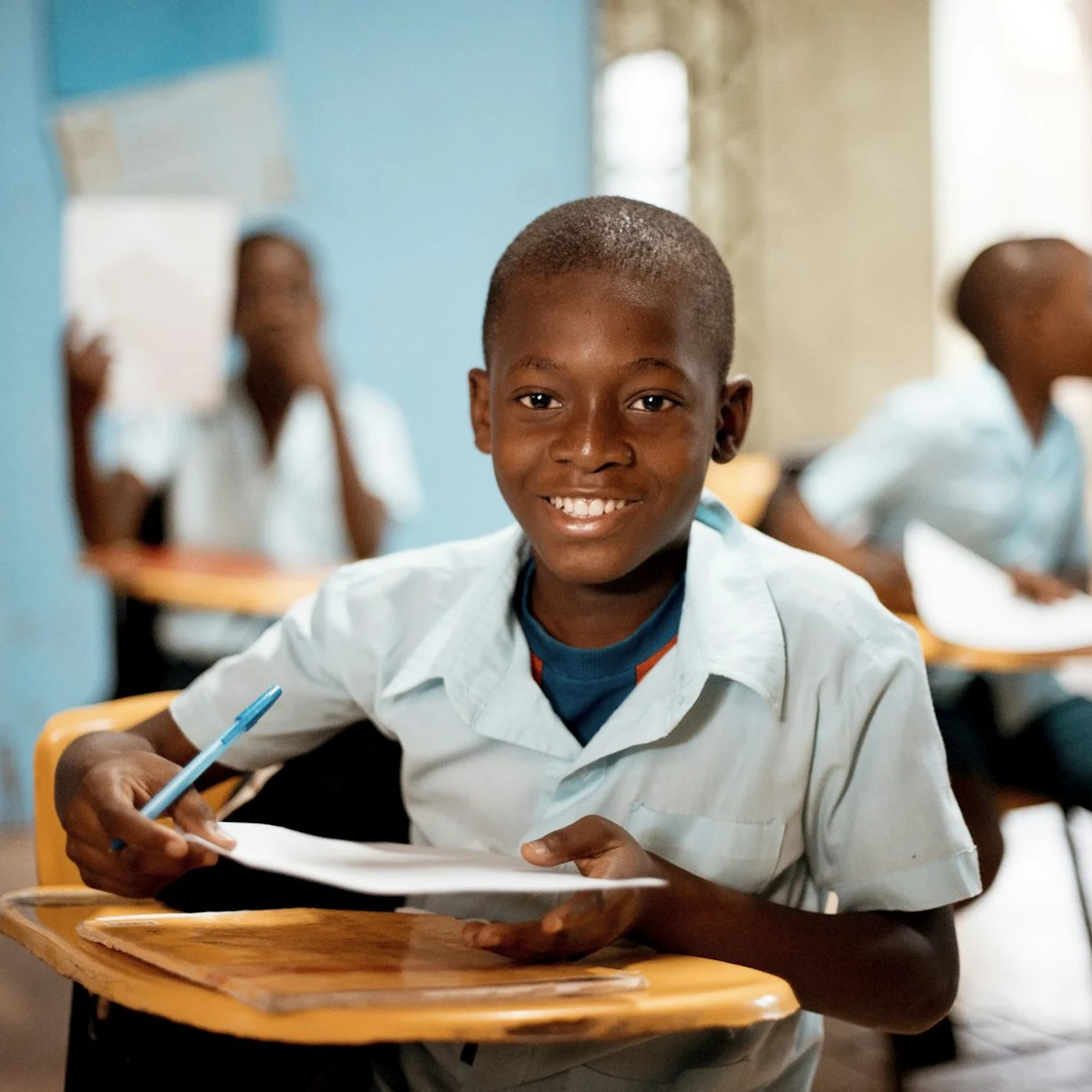 A schoolchild at a desk